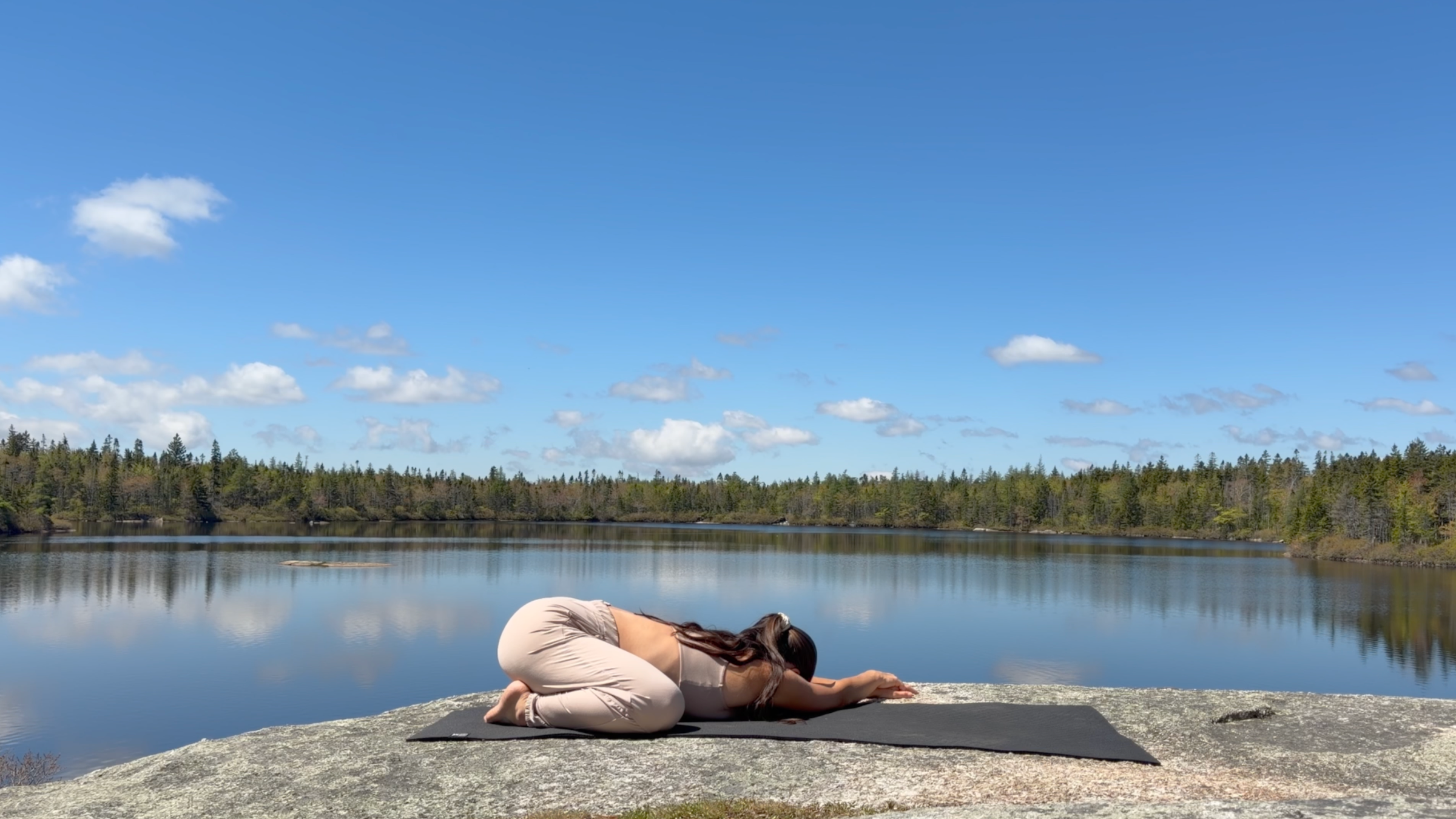 How to boost energy: yoga teacher Emily Baltzer in Child's Pose